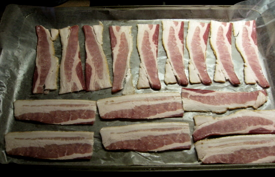 Next, lay out your bacon slices across it, one-slice deep.